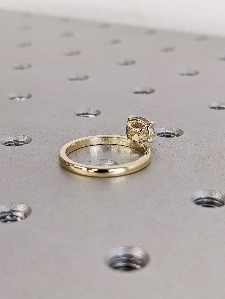 Oval east west engagement ring with brilliant diamond sparkle