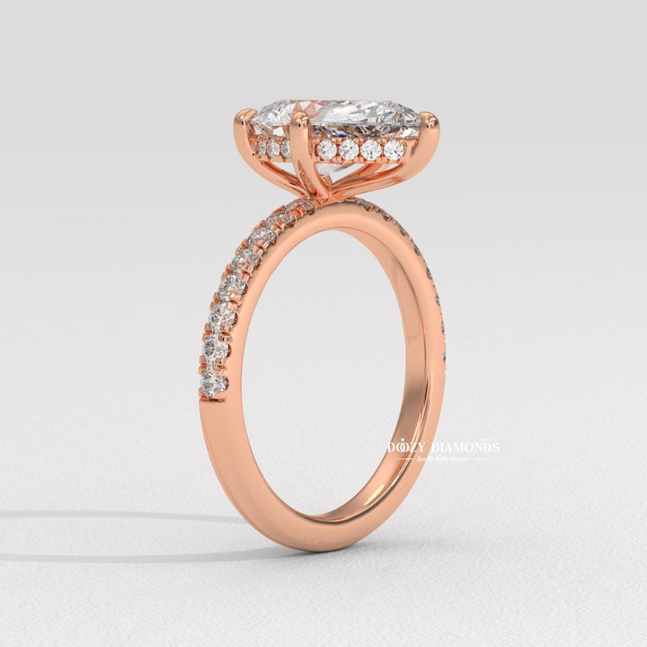Pear solitaire engagement ring close-up showing high clarity diamond clarity