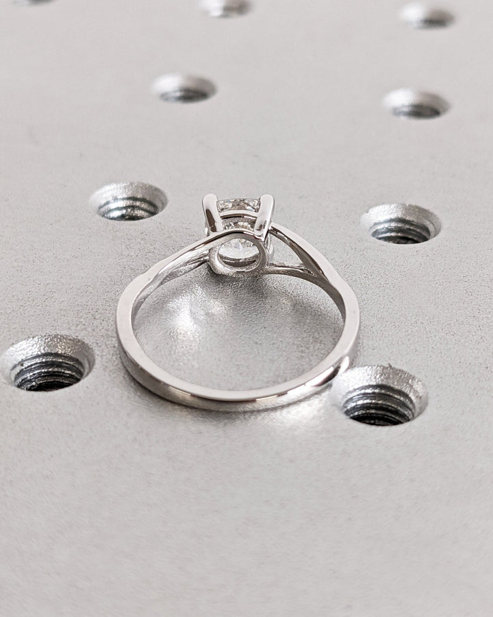 Cushion split shank lab grown diamond ring fitted on finger