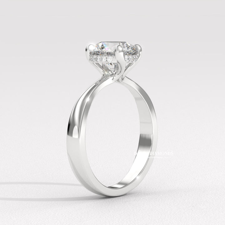 Macro shot of diamond cut diamond facets in solitaire ring setting