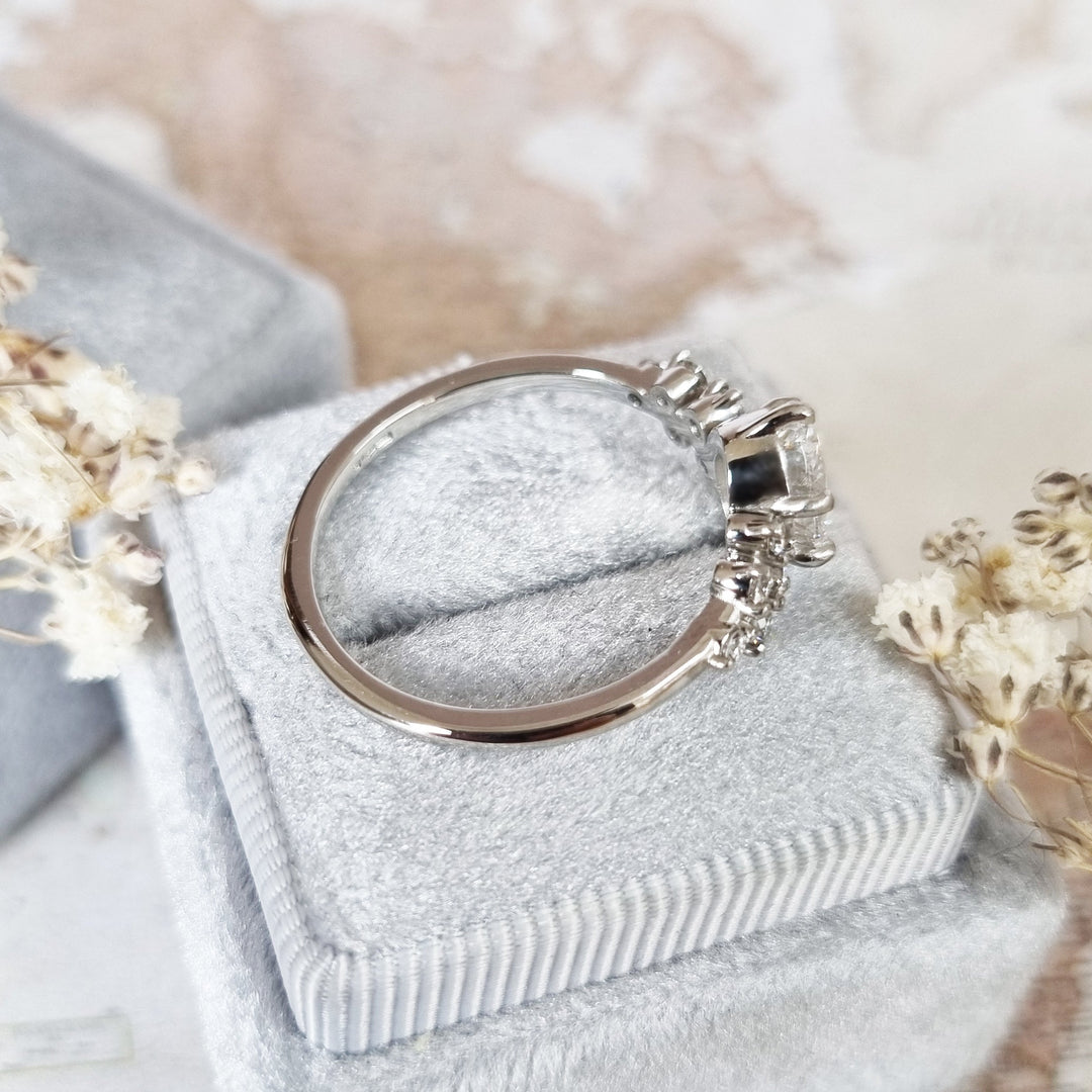 Classic oval cluster engagement ring crafted for everyday wear