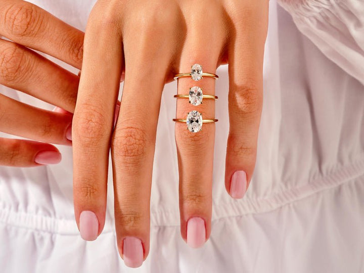 Macro shot of oval cut diamond facets in solitaire ring setting