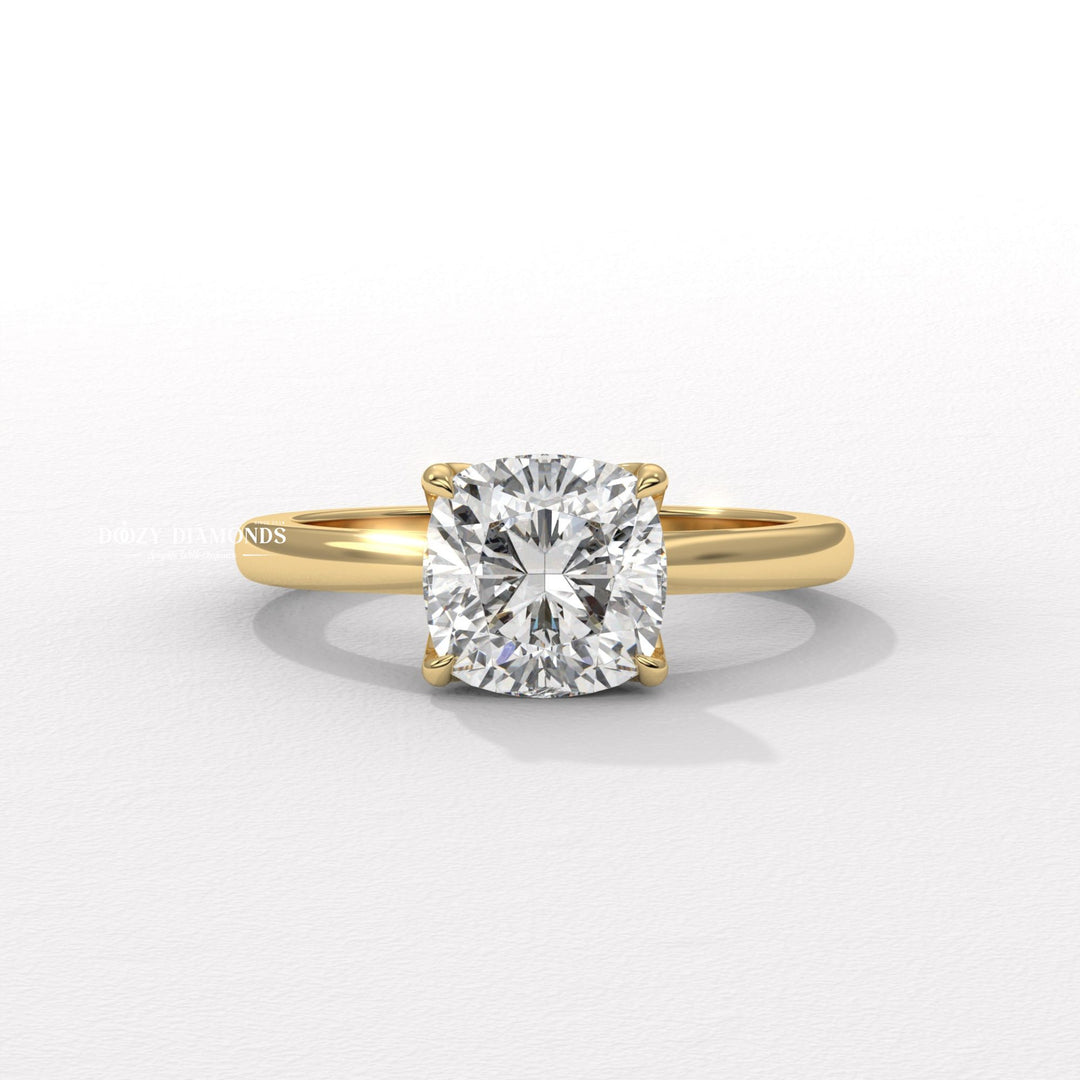 Cushion solitaire diamond ring displayed on jewelry stand