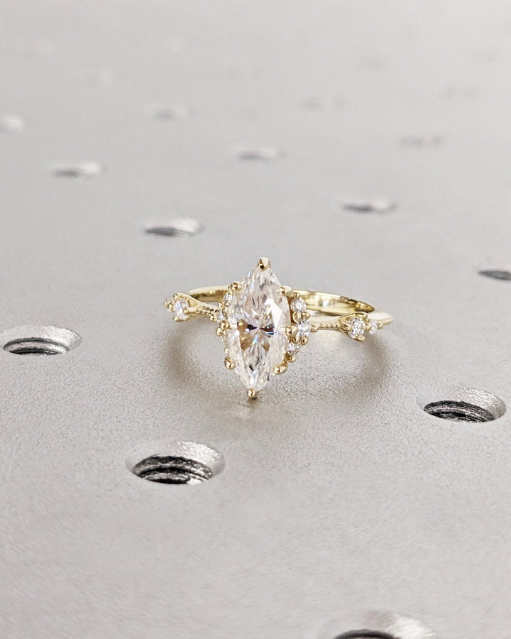 Marquise cluster lab grown diamond ring side profile in gold setting