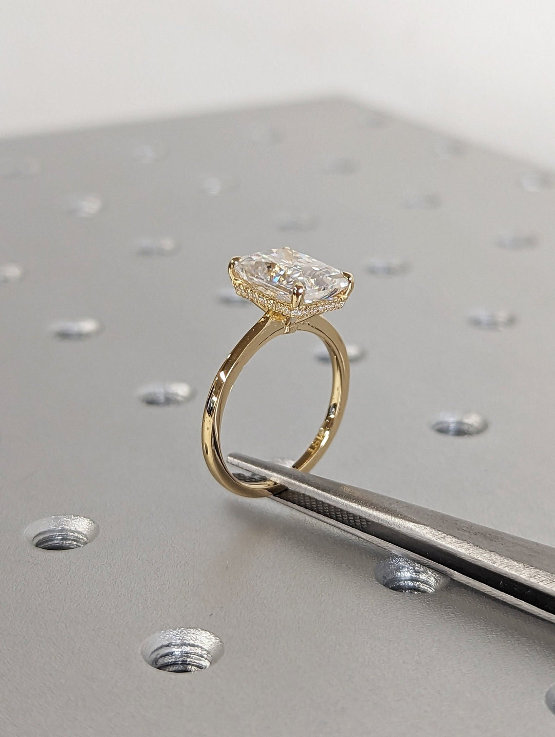 Classic radiant hidden halo engagement ring crafted for everyday wear