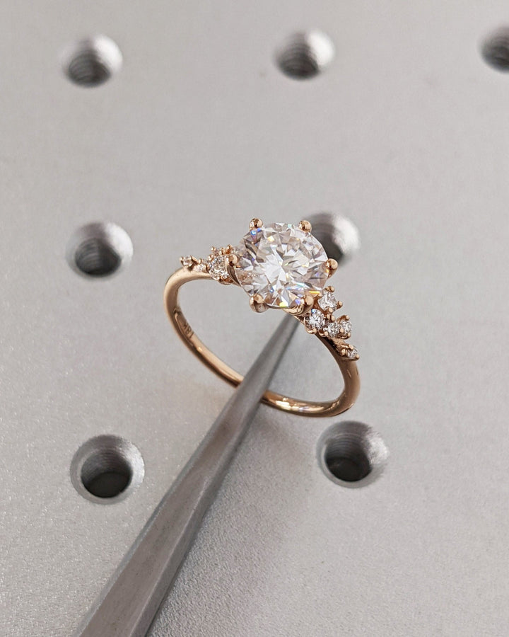 Lifestyle shot of round cluster diamond ring on hand
