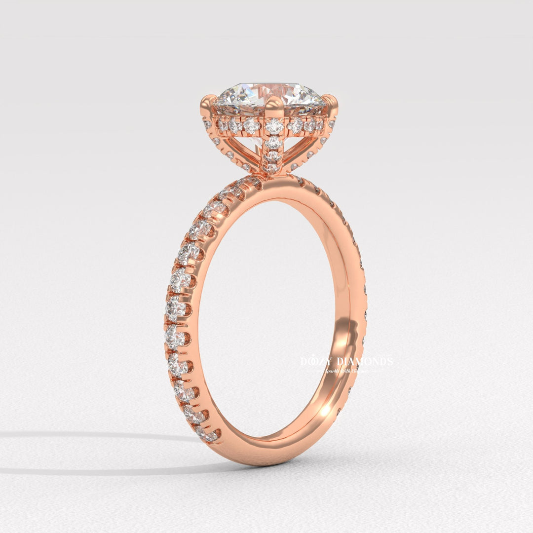 Round hidden halo engagement ring finished in polished solid gold