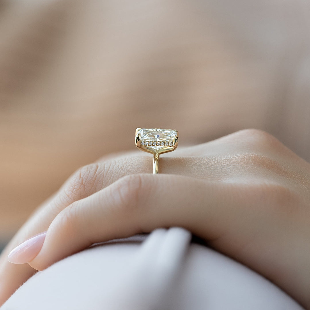 Radiant hidden halo ring set with an IGI graded diamond
