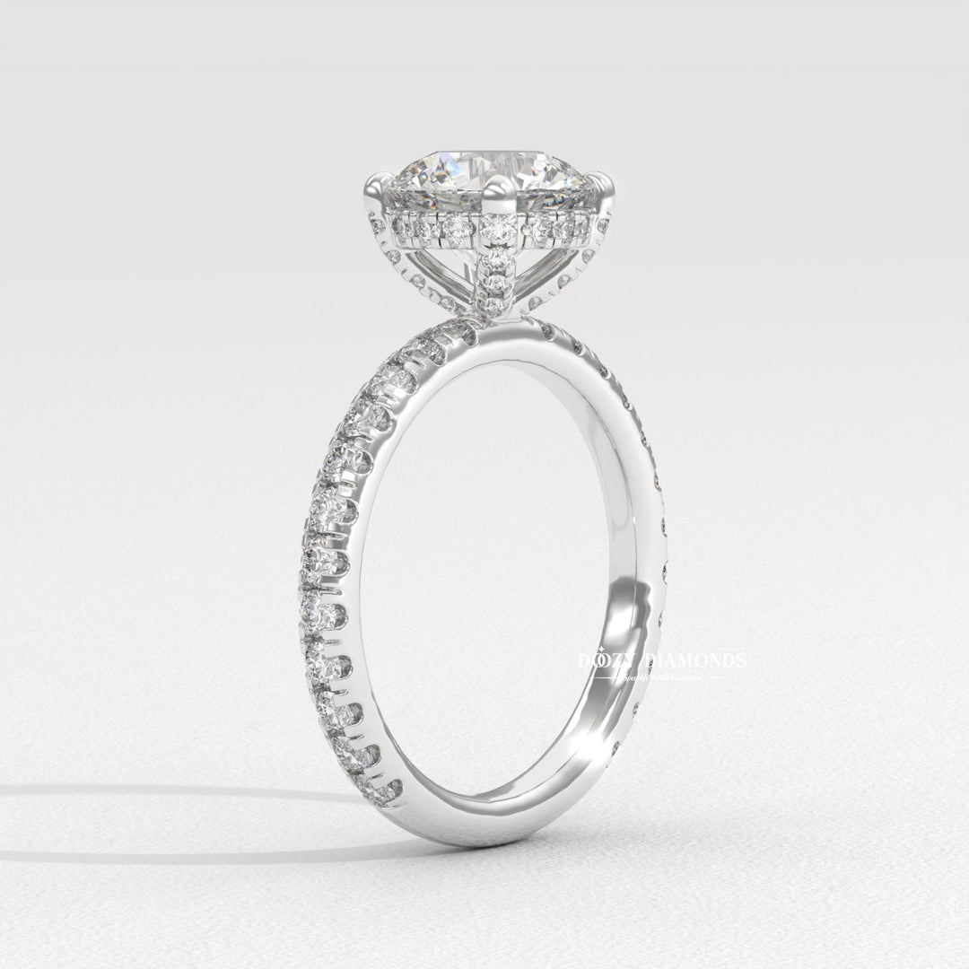 Angled view of round cut diamond in hidden halo setting