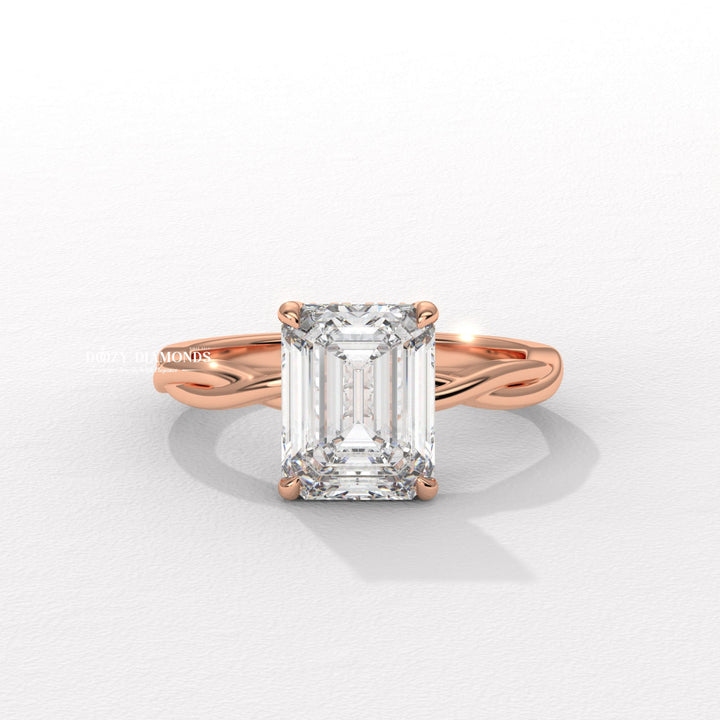 Unboxing view of emerald cut solitaire diamond engagement ring