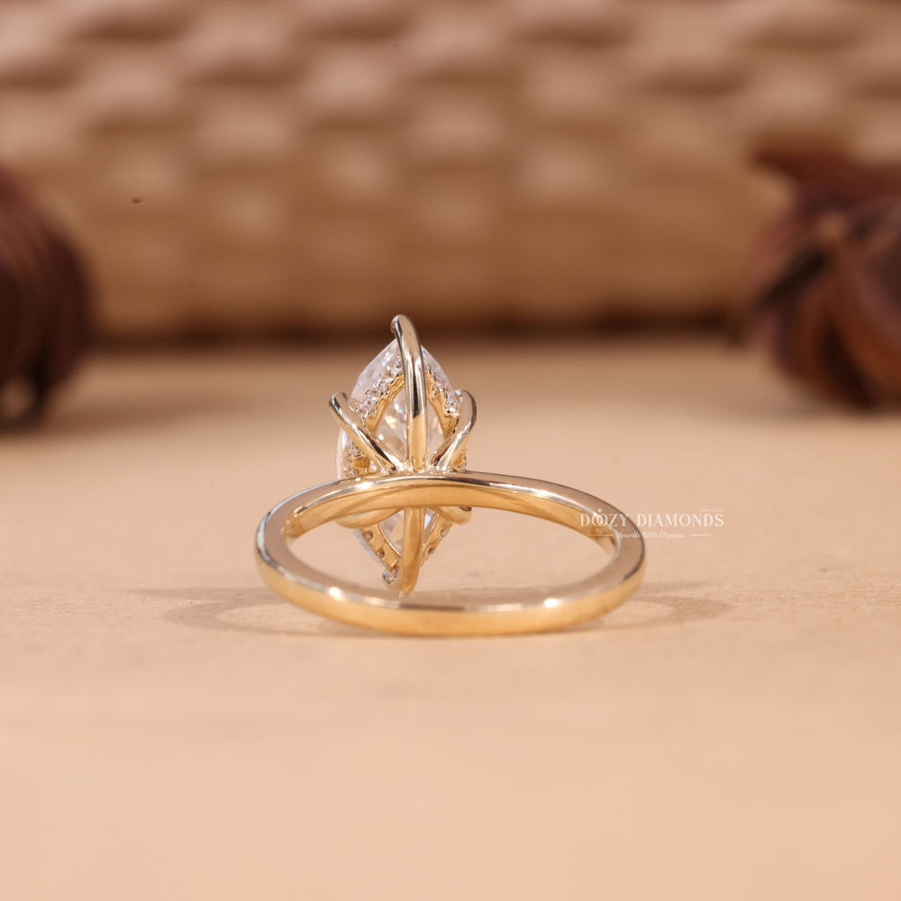 Premium marquise cut hidden halo engagement ring crafted in solid gold