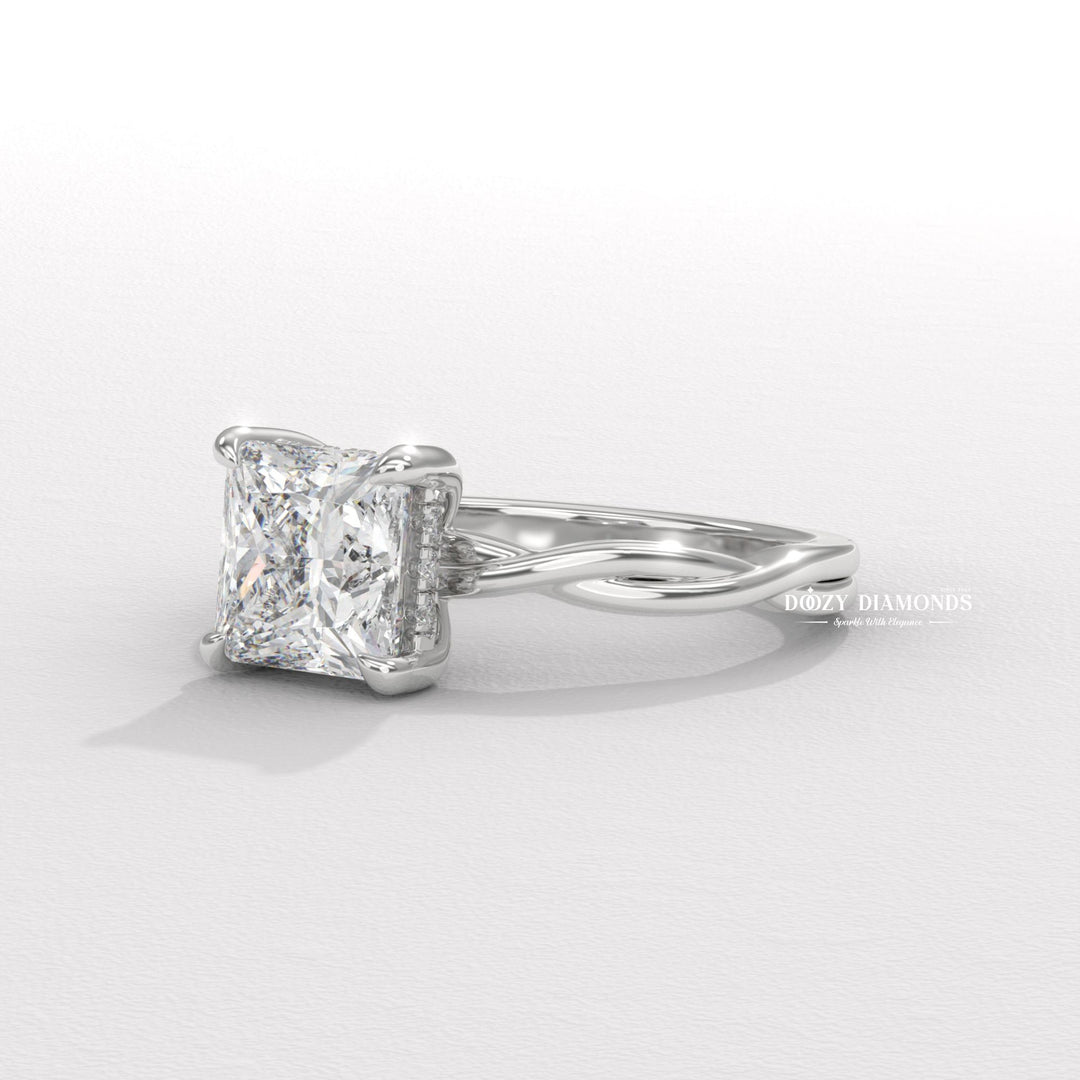 Princess solitaire engagement ring shown on hand for true-to-life sizing