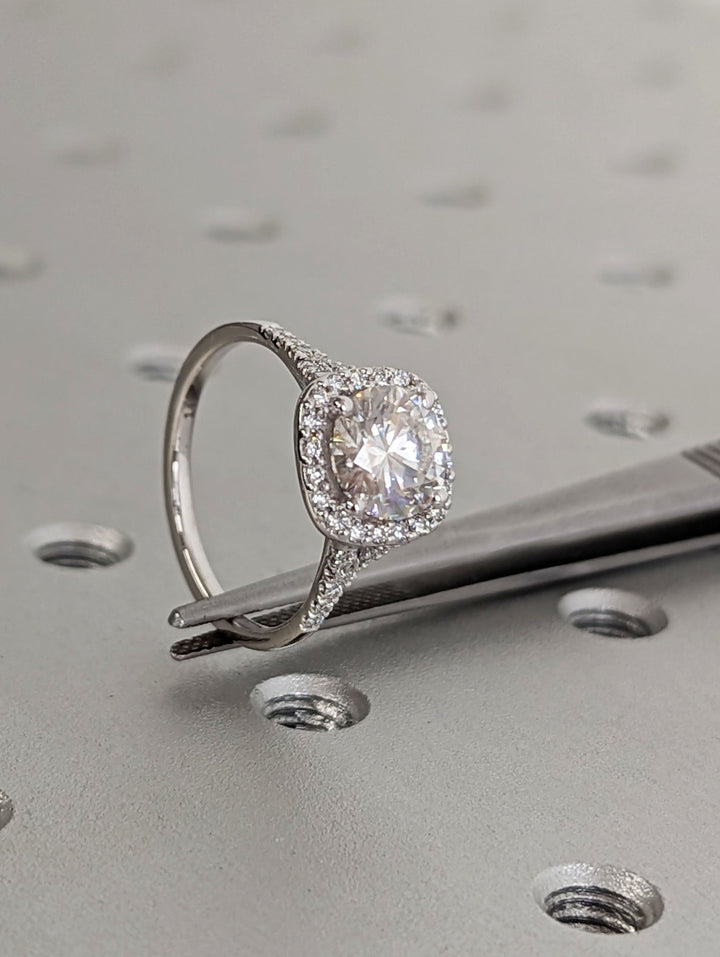 Shop the round cut pave engagement ring collection online
