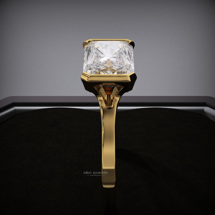 Radiant cut diamond ring worn on hand