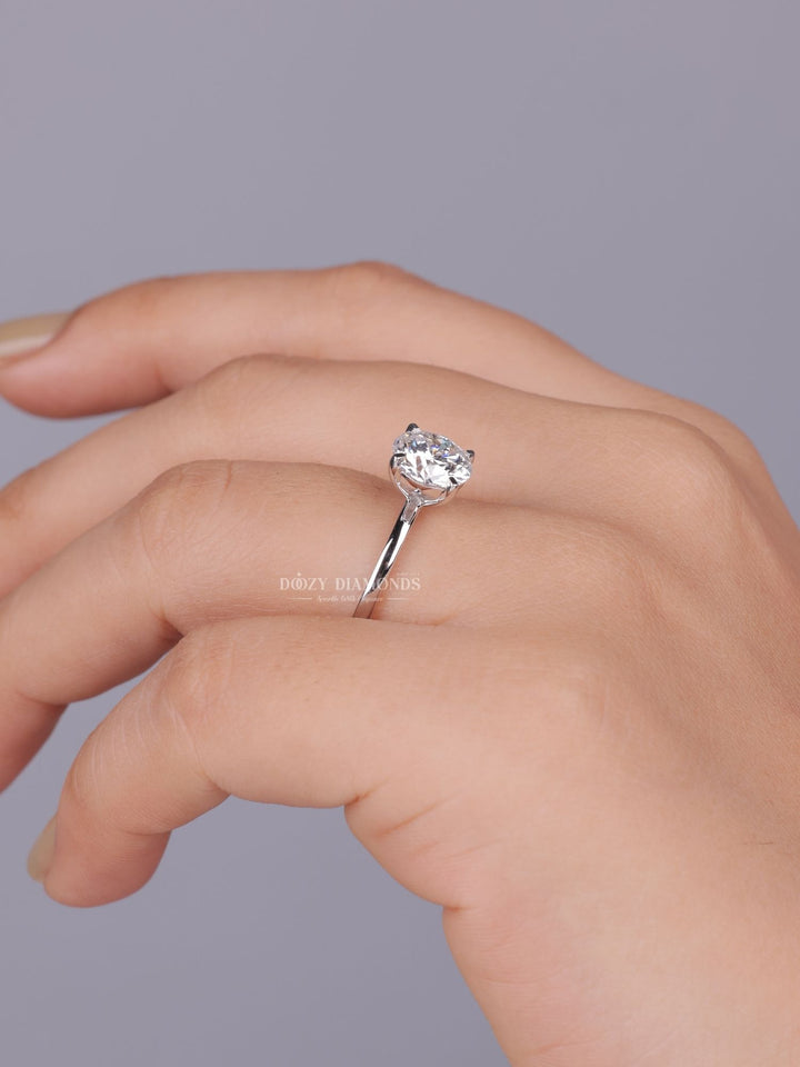 Round cut engagement ring side view showing band detail