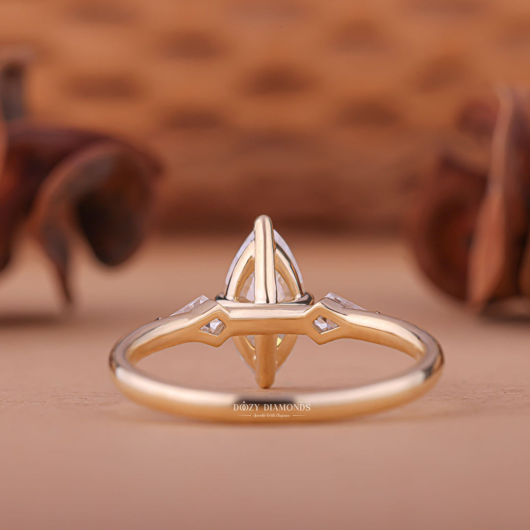 Marquise solitaire diamond engagement ring available in multiple metals