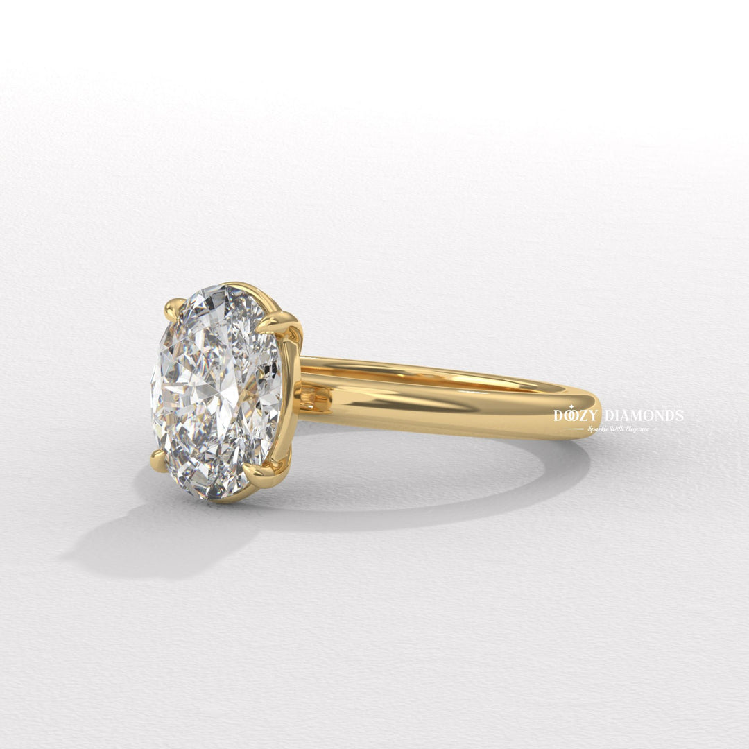 Oval solitaire lab grown diamond ring fitted on finger