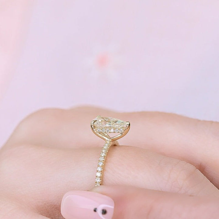 Pear cut engagement ring side view showing band detail