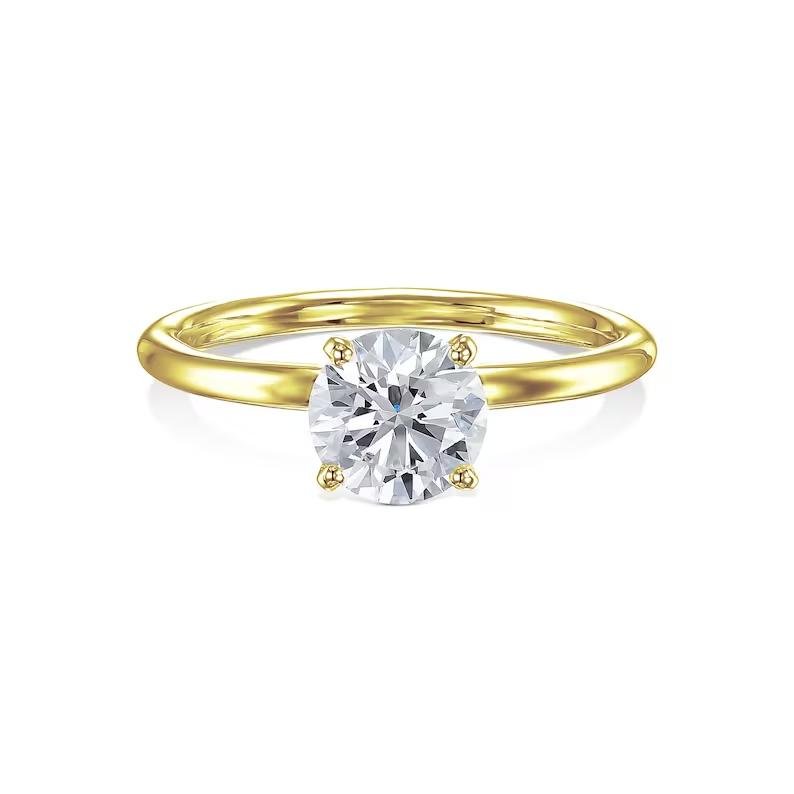 Premium round cut solitaire engagement ring crafted in solid gold
