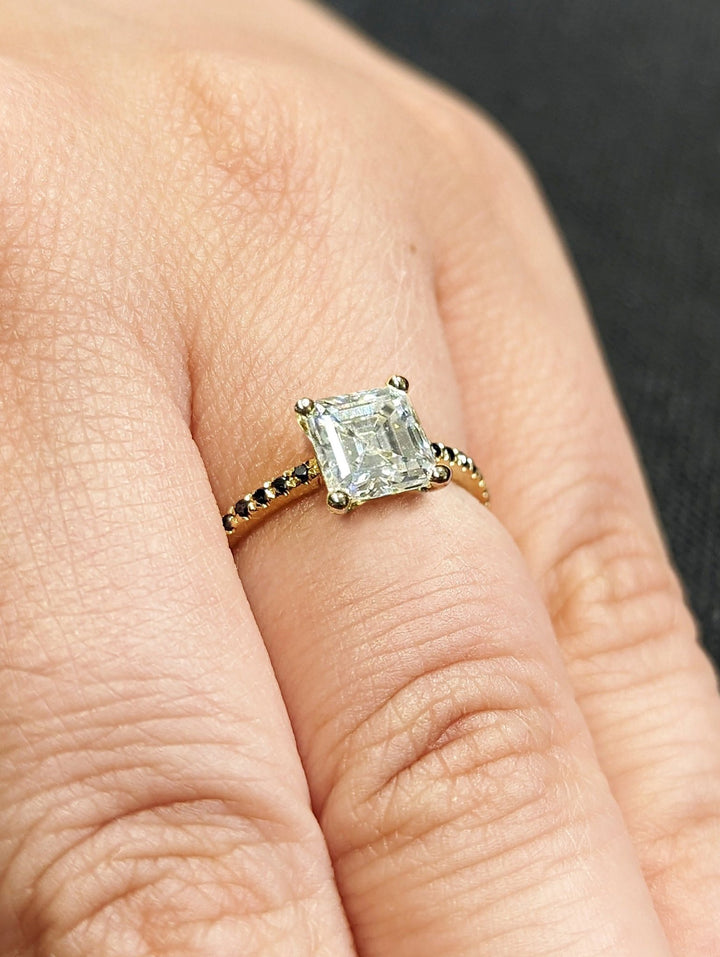 Asscher pave engagement ring viewed from the side