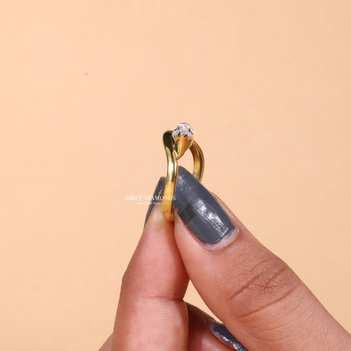 Premium marquise cut solitaire engagement ring crafted in solid gold