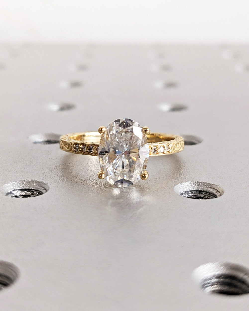 Oval cut vintage engagement ring with IGI certified center diamond