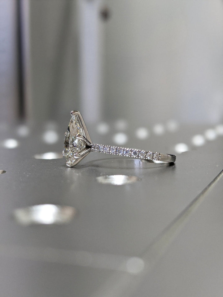 Pear pave lab grown diamond ring fitted on finger