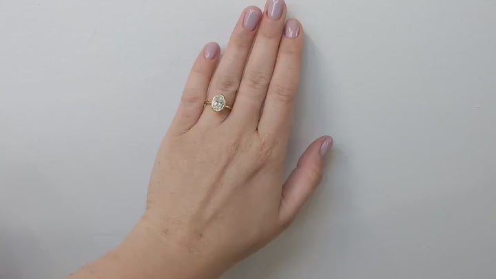 oval bezel engagement ring