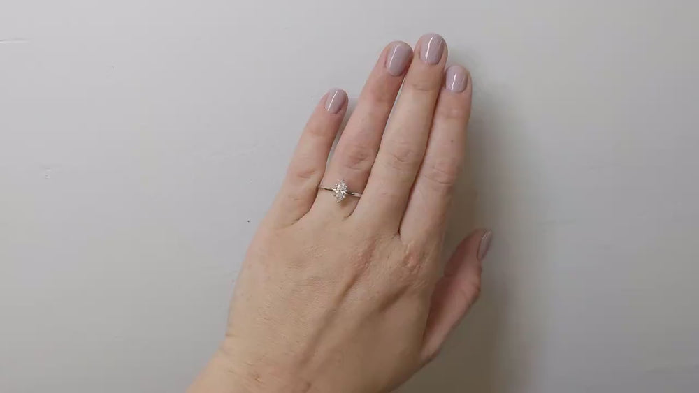 marquise cut solitaire ring,