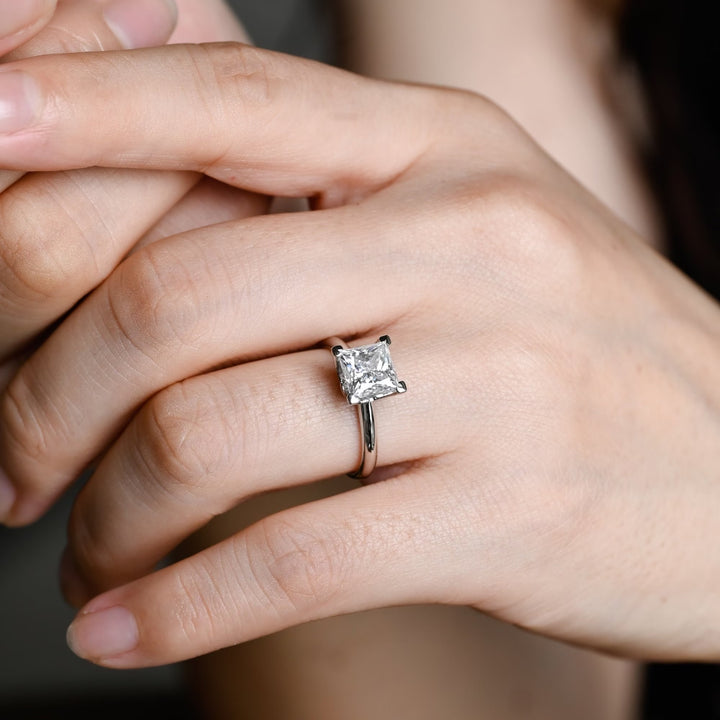 Princess solitaire engagement ring close-up showing high clarity diamond clarity