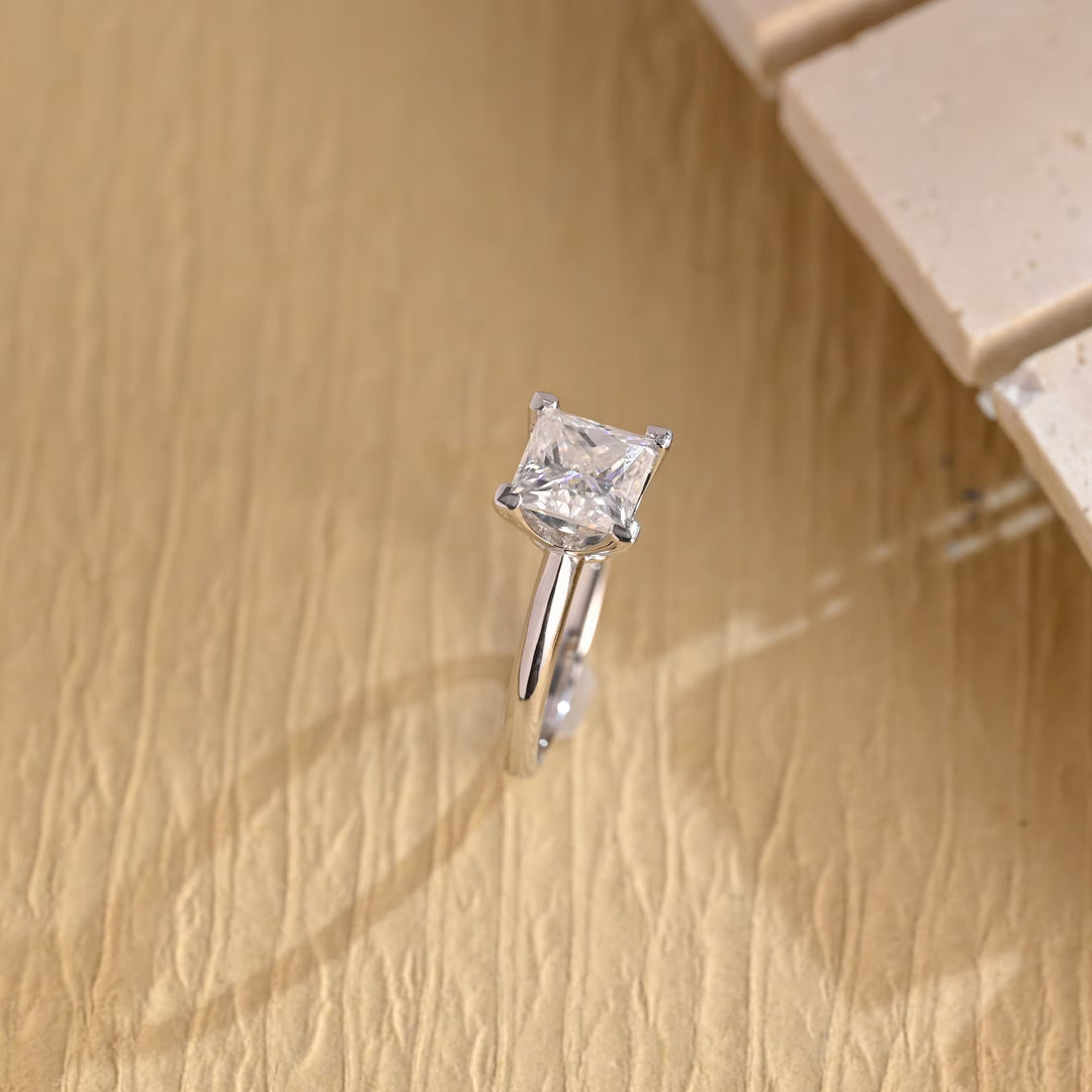 Top-down view of princess cut solitaire engagement ring