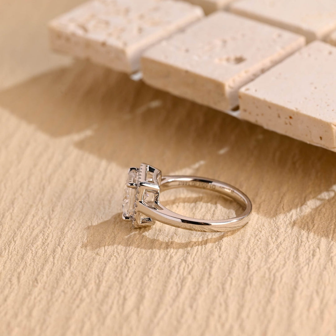 Unboxing view of princess cut halo diamond engagement ring