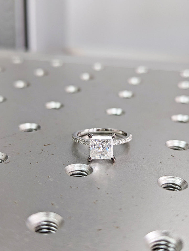 Princess cut pave engagement ring with IGI certified center diamond
