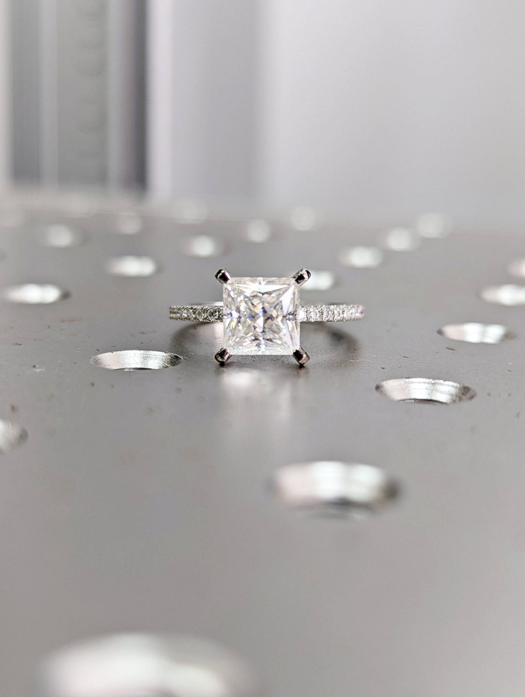 Princess cut diamond ring worn on hand