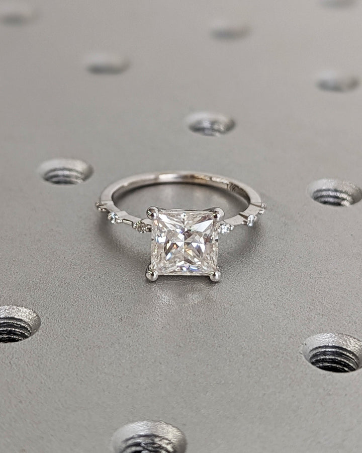Princess pave ring set with an IGI graded diamond