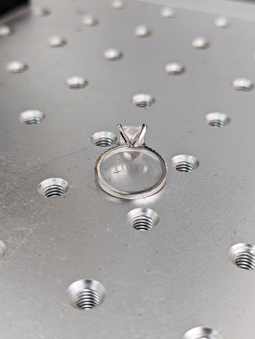 Princess cut pave engagement ring shown in real-life wear