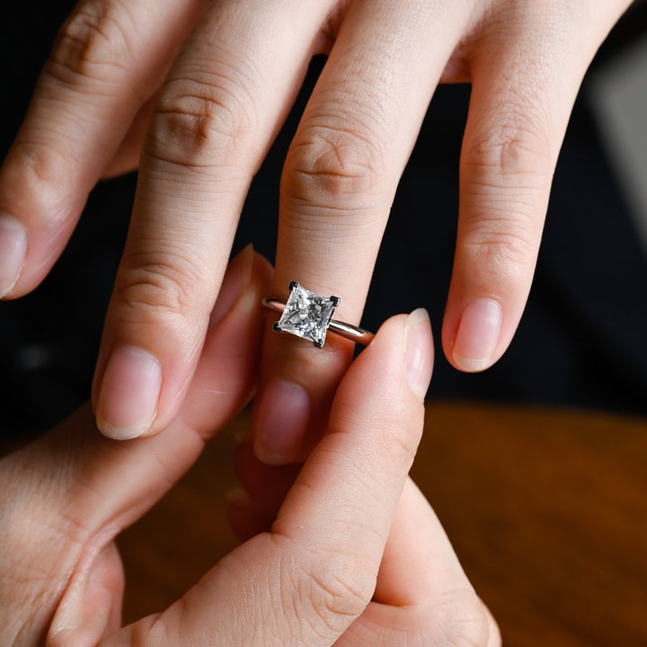 Princess solitaire engagement ring with brilliant diamond sparkle