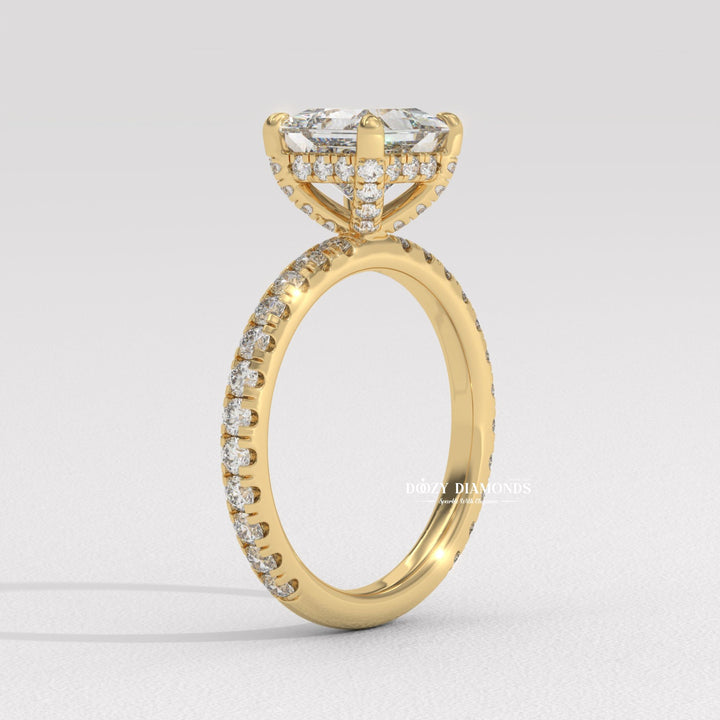Princess hidden halo diamond ring displayed on jewelry stand