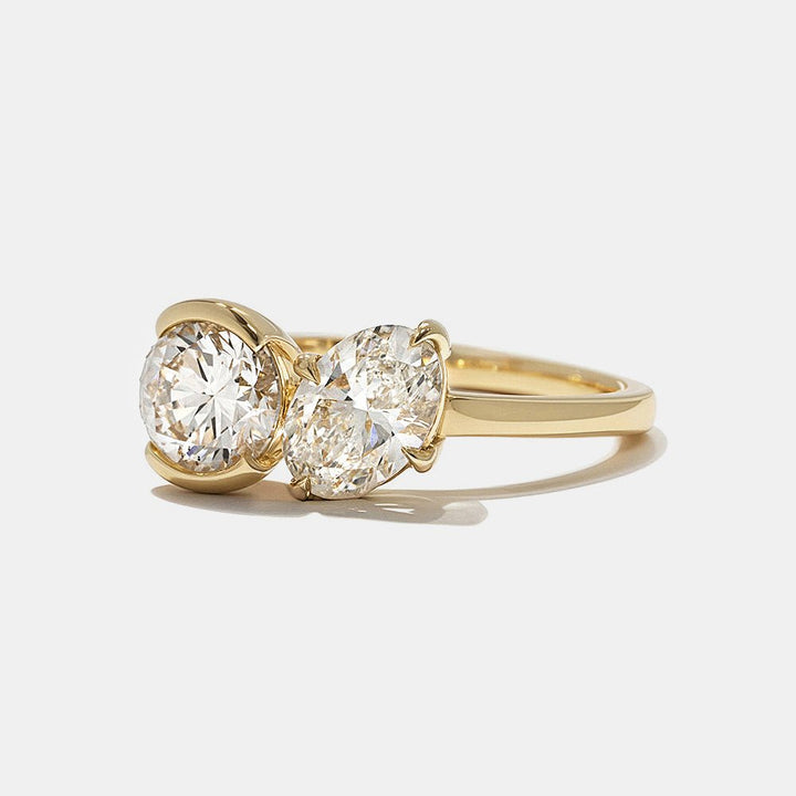 Round solitaire diamond engagement ring available in multiple metals