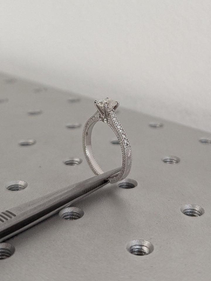 Premium round cut vintage engagement ring crafted in solid gold