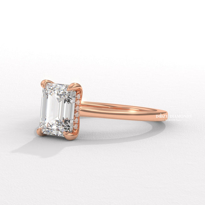 Premium emerald cut hidden halo engagement ring crafted in solid gold