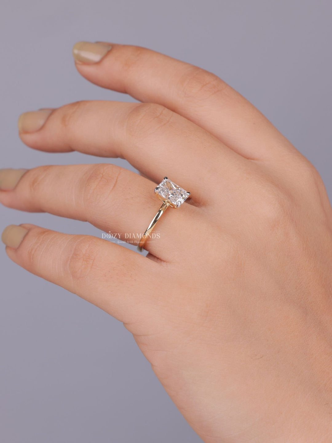 Side angle of radiant solitaire diamond engagement ring