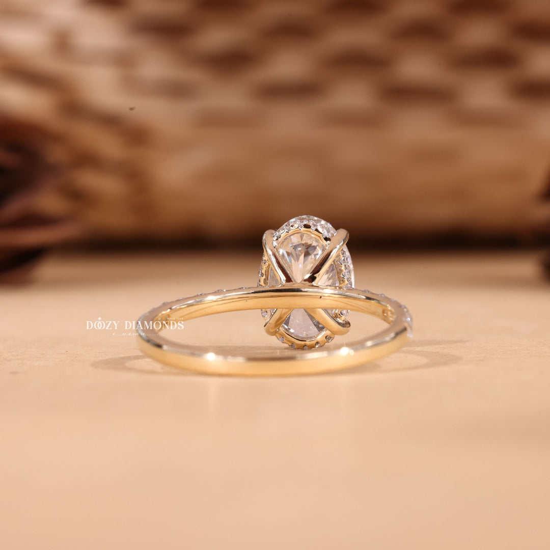 Oval cut hidden halo engagement ring with IGI certified center diamond