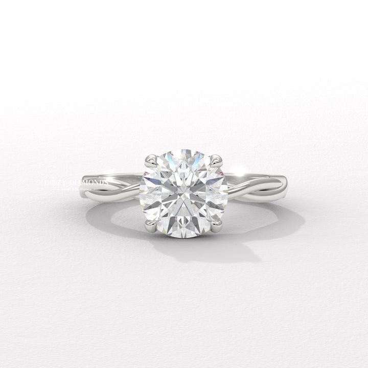 Round solitaire engagement ring with IGI certificate and packaging