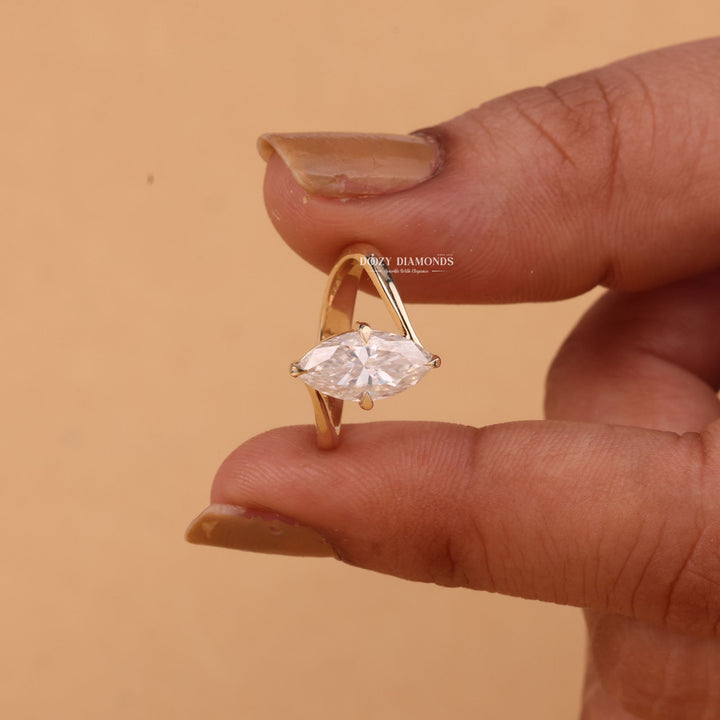 Marquise cut engagement ring side view showing band detail