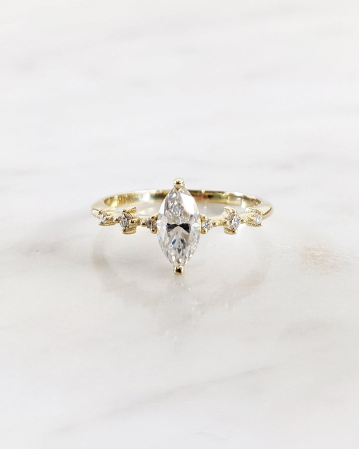 Marquise pave engagement ring close-up showing high clarity diamond clarity