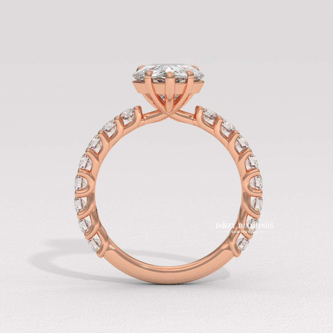 Detailed close-up of pear solitaire diamond engagement ring