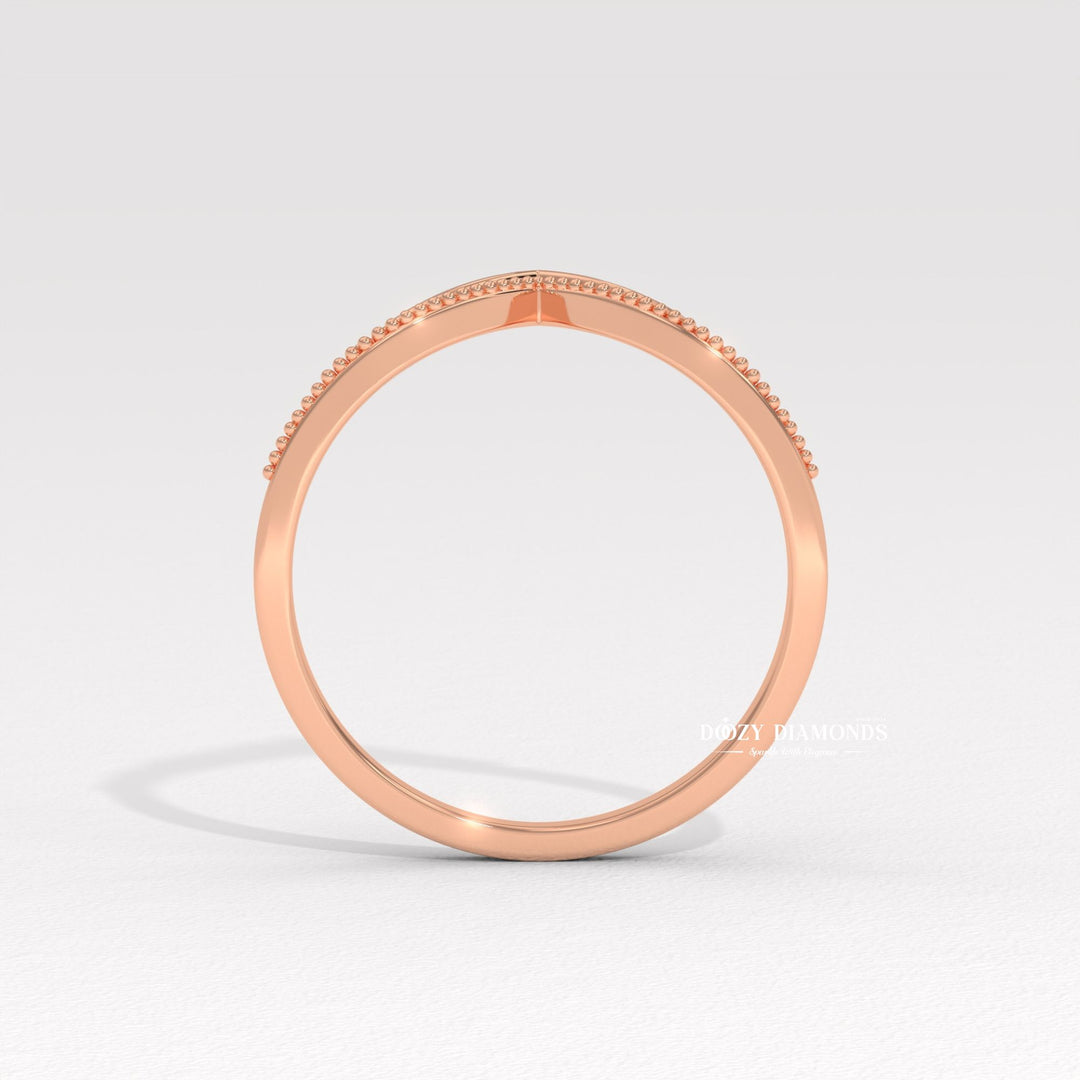 Side view of round diamond wedding band