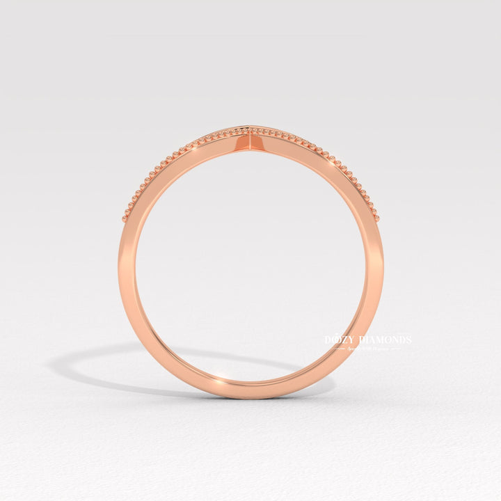 Side view of round diamond wedding band