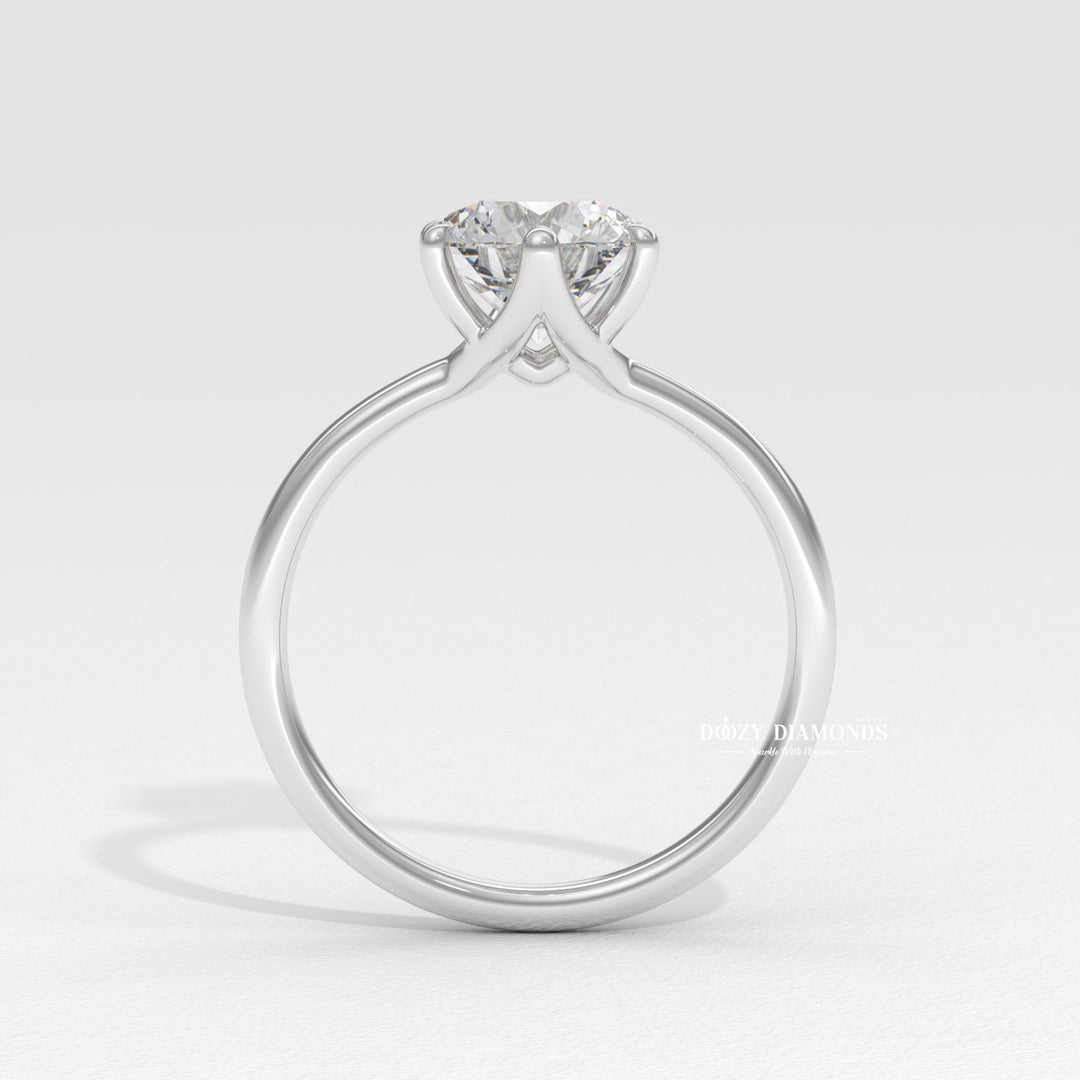 Classic round solitaire engagement ring crafted for everyday wear